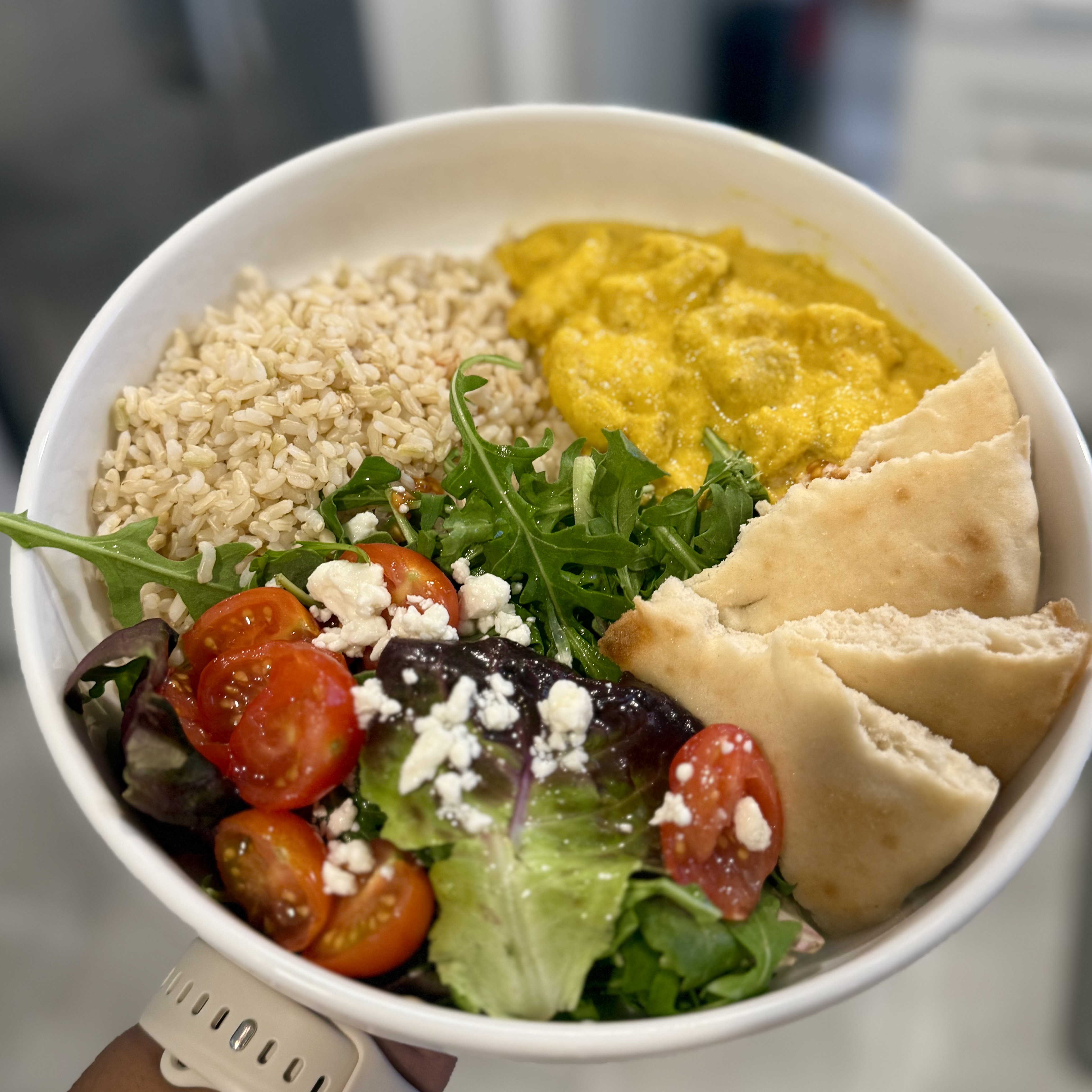 mango chicken curry with greek salad and naan